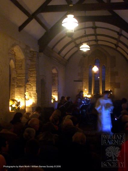 Singing Christmas Carols in Whitcombe Church